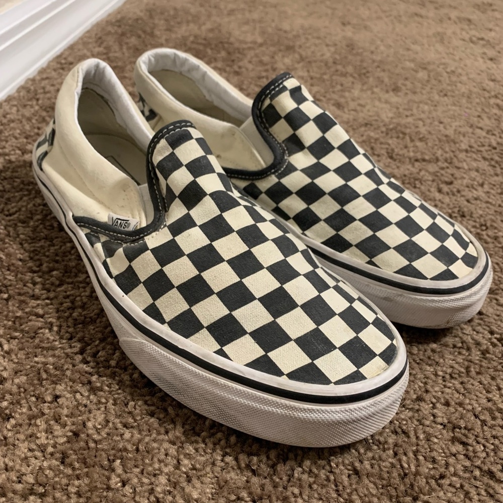 Black and white checkered slip on vans